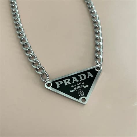 men prada necklace|prada necklace triangle dupe.